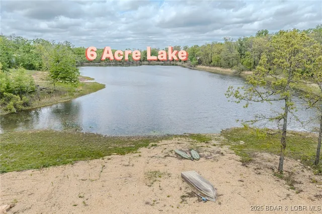 $549,900 | 735 Lake Of The Woods Drive, Macks Creek, MO 65786