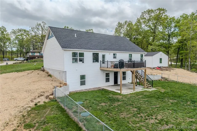 $549,900 | 735 Lake Of The Woods Drive, Macks Creek, MO 65786