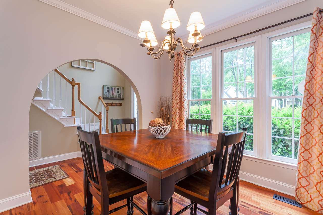 12208 Warwickshire Way Raleigh, NC 27613 - Photo 4 of 23 More hardwoods and tons of natural light. Dining Room