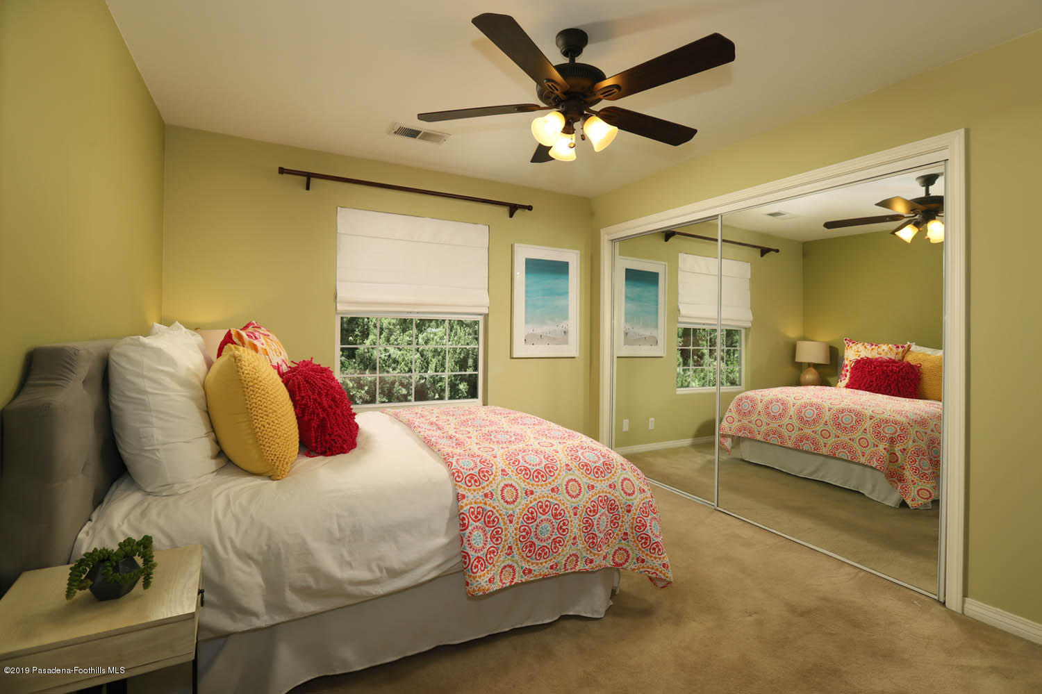 1934 Pasadena Glen Road Pasadena, CA 91107 - Photo 14 of 26 a bedroom with a large bed and a large window