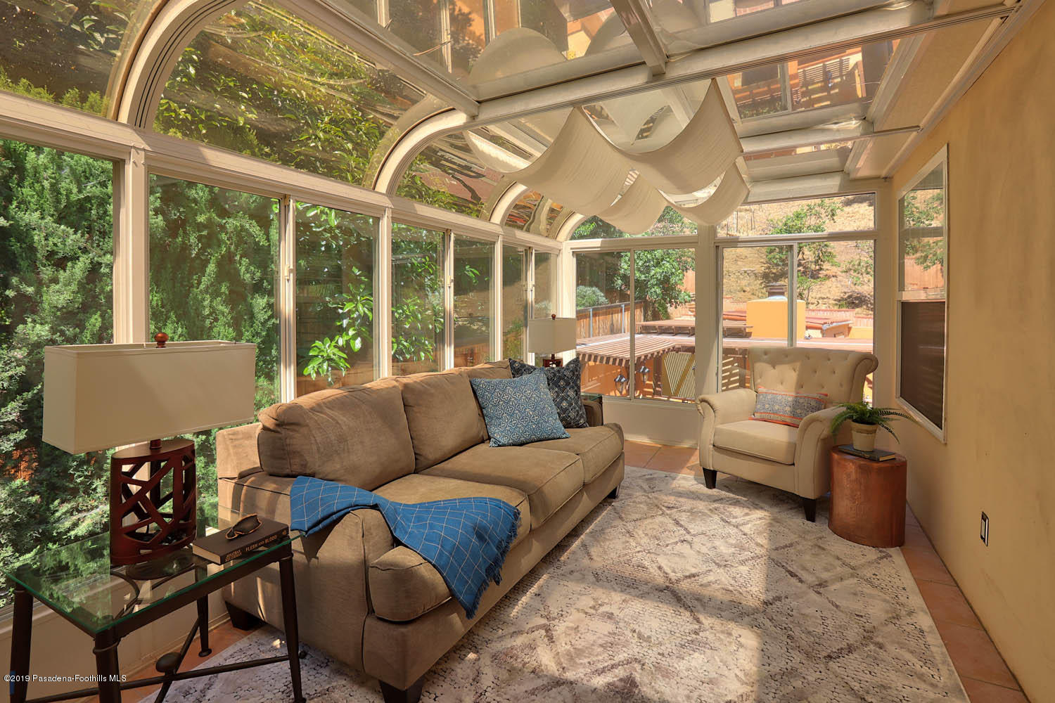 1934 Pasadena Glen Road Pasadena, CA 91107 - Photo 20 of 26 a living room with furniture and a large window