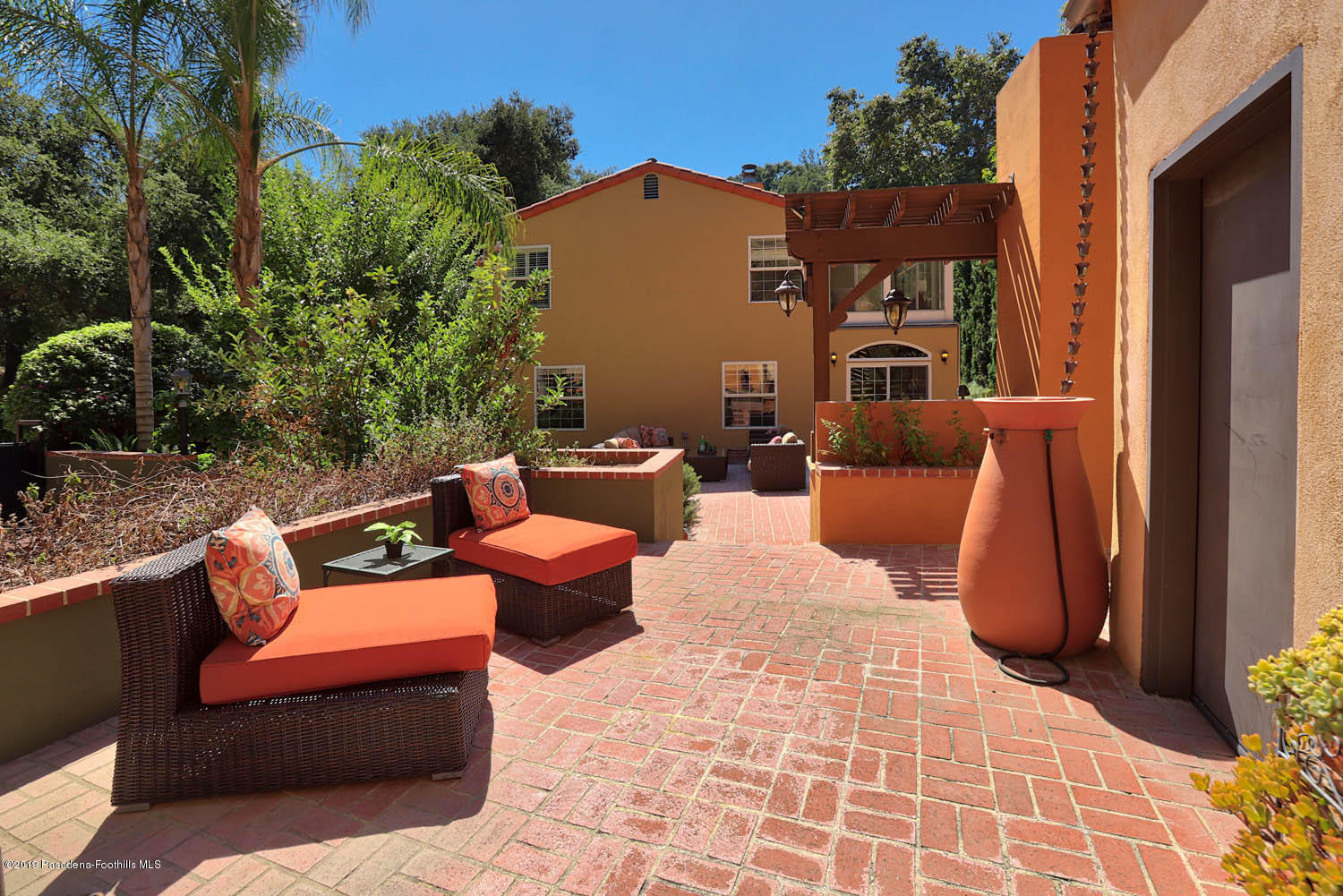 1934 Pasadena Glen Road Pasadena, CA 91107 - Photo 24 of 26 a outdoor space with patio fireplace