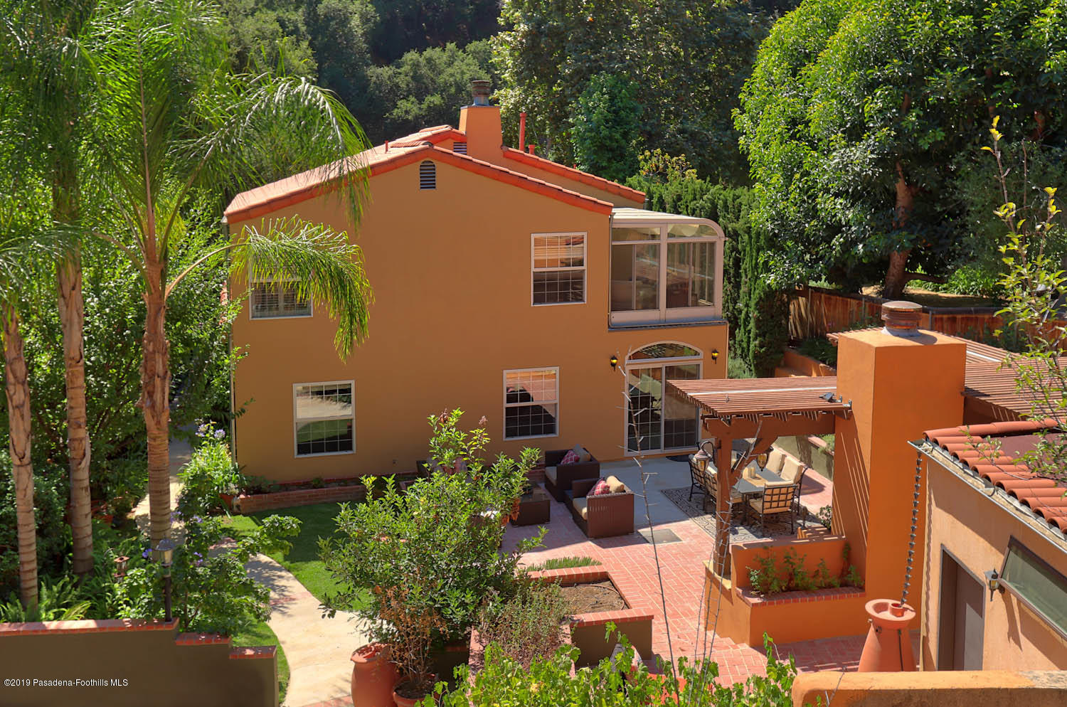 1934 Pasadena Glen Road Pasadena, CA 91107 - Photo 26 of 26 a front view of a house with garden
