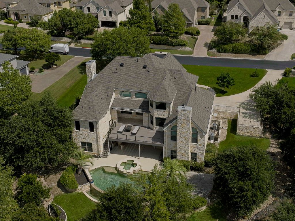 111 Sebastians Run Austin, TX 78738 - Photo 1 of 1 an aerial view of a house with a garden