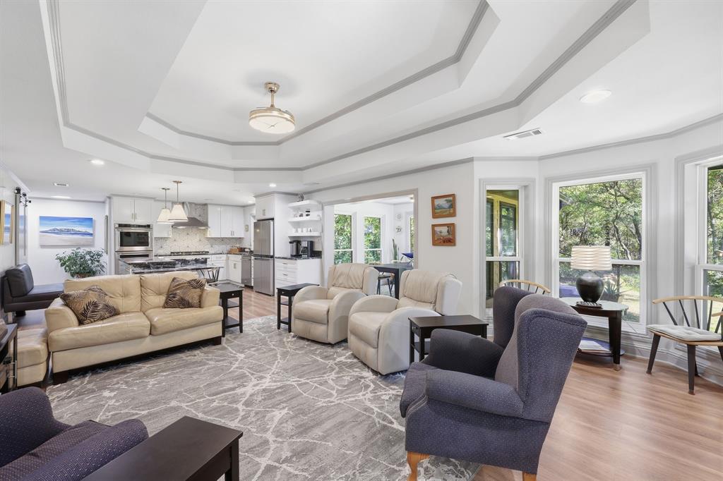 4000 Post Oak Road Flower Mound, TX 75022 - Photo 25 of 40 Guest house - Living area view from the front entrance and looking toward the kitchen and dining area