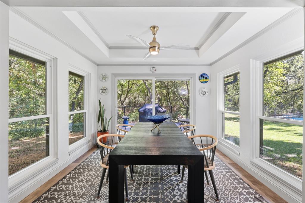 4000 Post Oak Road Flower Mound, TX 75022 - Photo 26 of 40 Guest house - Dining room that can double as a sun room with a raised ceiling, healthy amount of natural light, and ornamental molding
