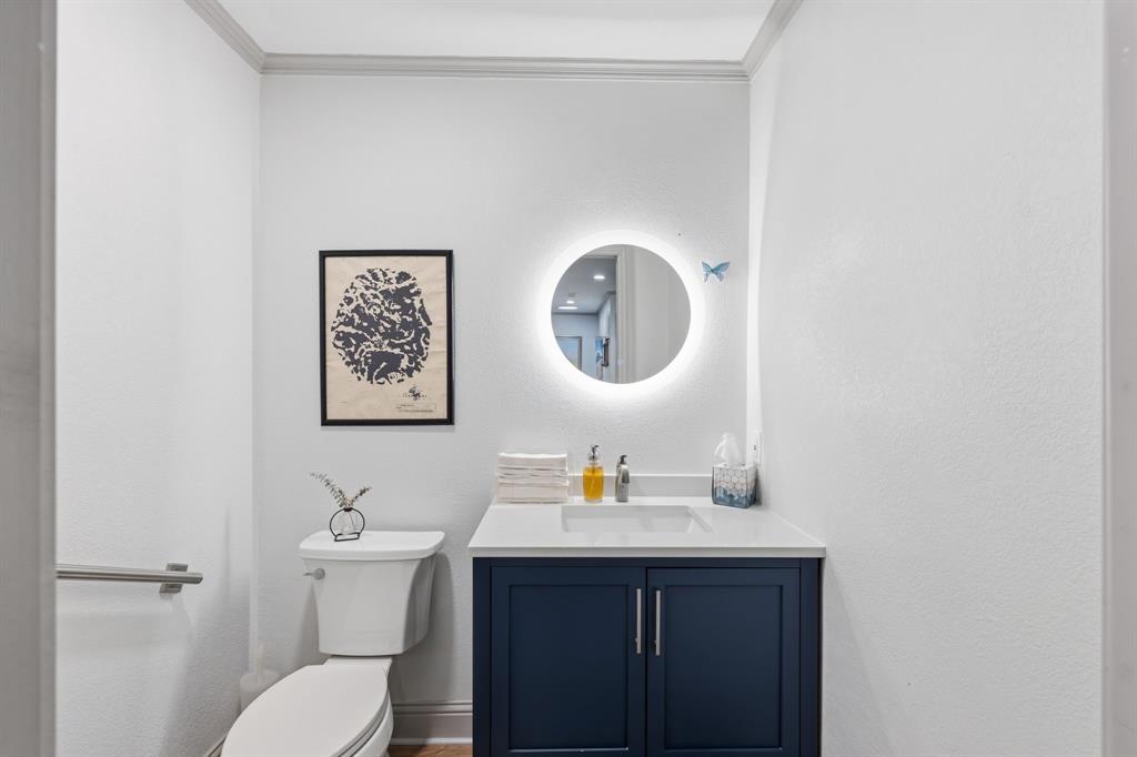 4000 Post Oak Road Flower Mound, TX 75022 - Photo 30 of 40 Guest house - Accessible half bathroom featuring led vanity