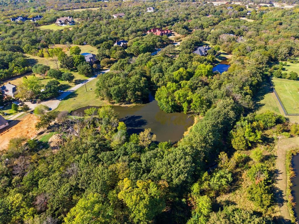 4000 Post Oak Road Flower Mound, TX 75022 - Photo 38 of 40 Aerial view of the community pond managed by the HOA
