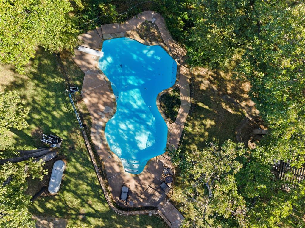 4000 Post Oak Road Flower Mound, TX 75022 - Photo 5 of 40 Drone / aerial view of the pool area