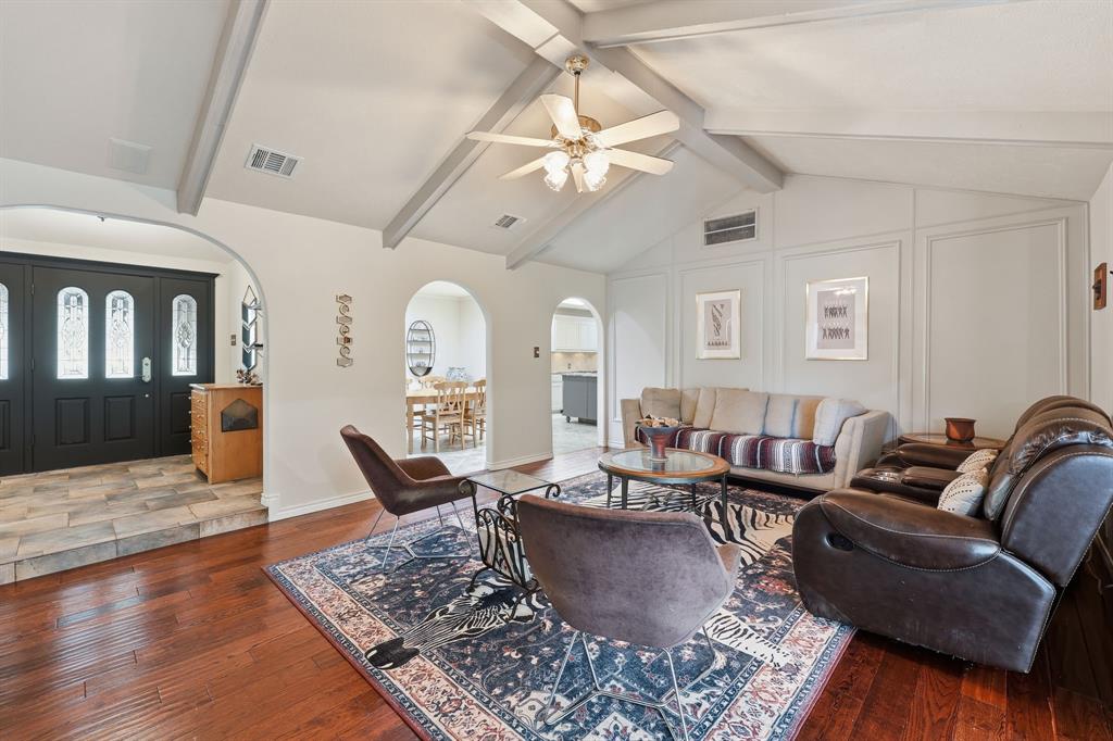 4000 Post Oak Road Flower Mound, TX 75022 - Photo 7 of 40 Main house - Living room looking to the raised entryway and leading into the dining area and kitchen