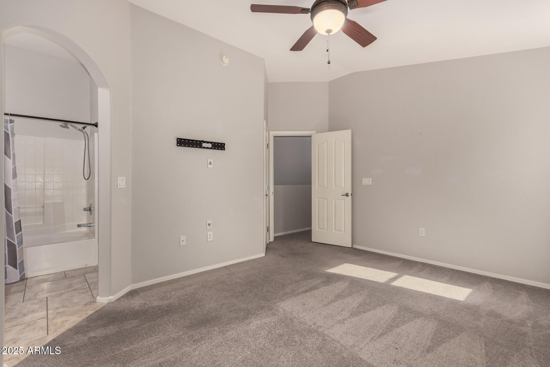 2150 West Alameda Road, Unit 1024 Phoenix, AZ 85085 - Photo 12 of 24 an empty room with fan and entrance