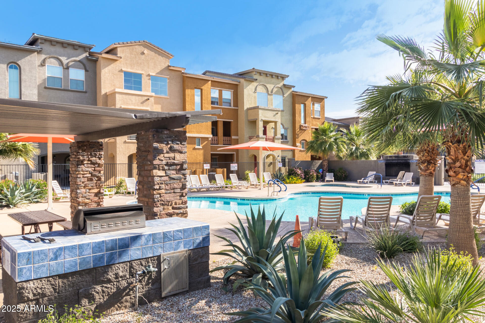 2150 West Alameda Road, Unit 1024 Phoenix, AZ 85085 - Photo 23 of 24 a front view of a house with outdoor seating