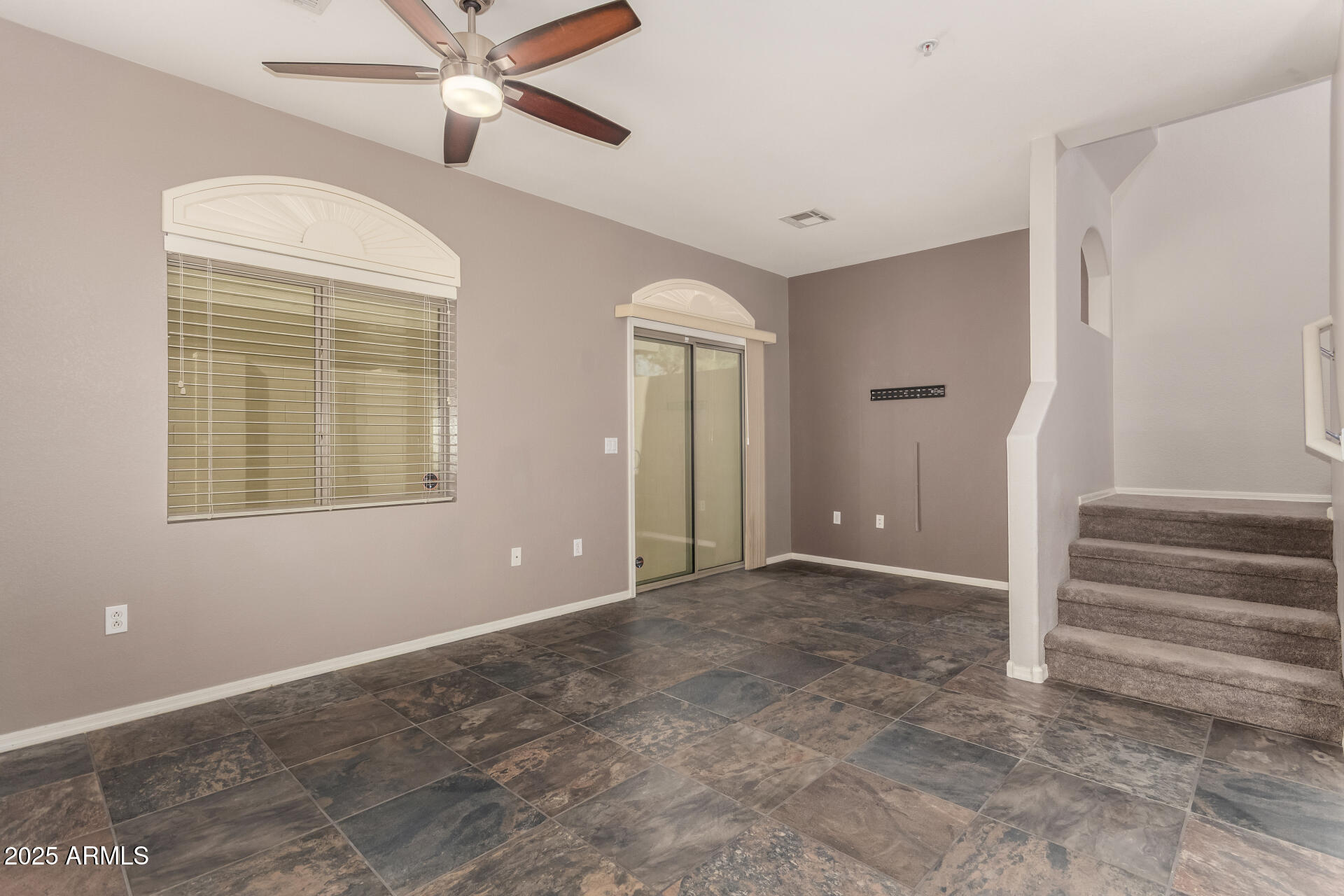 2150 West Alameda Road, Unit 1024 Phoenix, AZ 85085 - Photo 9 of 24 a view of an empty room with a window