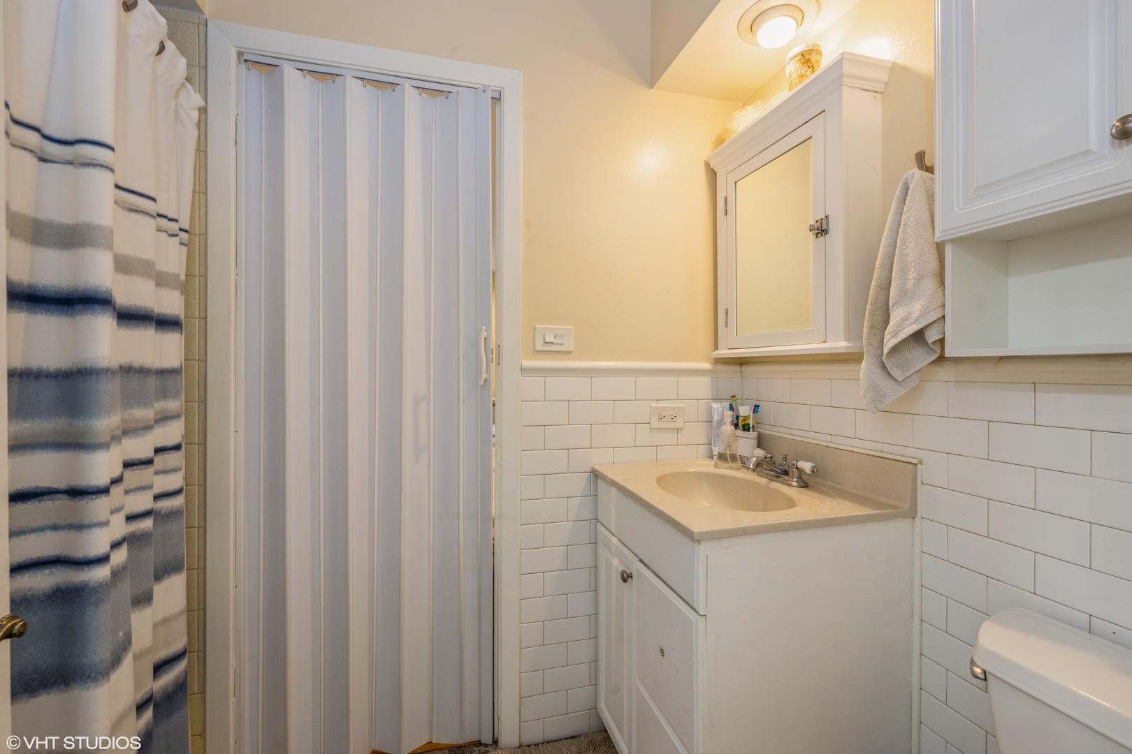 8705 45th Street Lyons, IL 60534 - Photo 12 of 19 a bathroom with a sink and a mirror