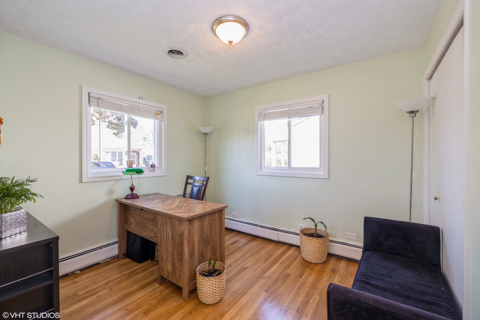8705 45th Street Lyons, IL 60534 - Photo 13 of 19 a room with furniture and a wooden floor