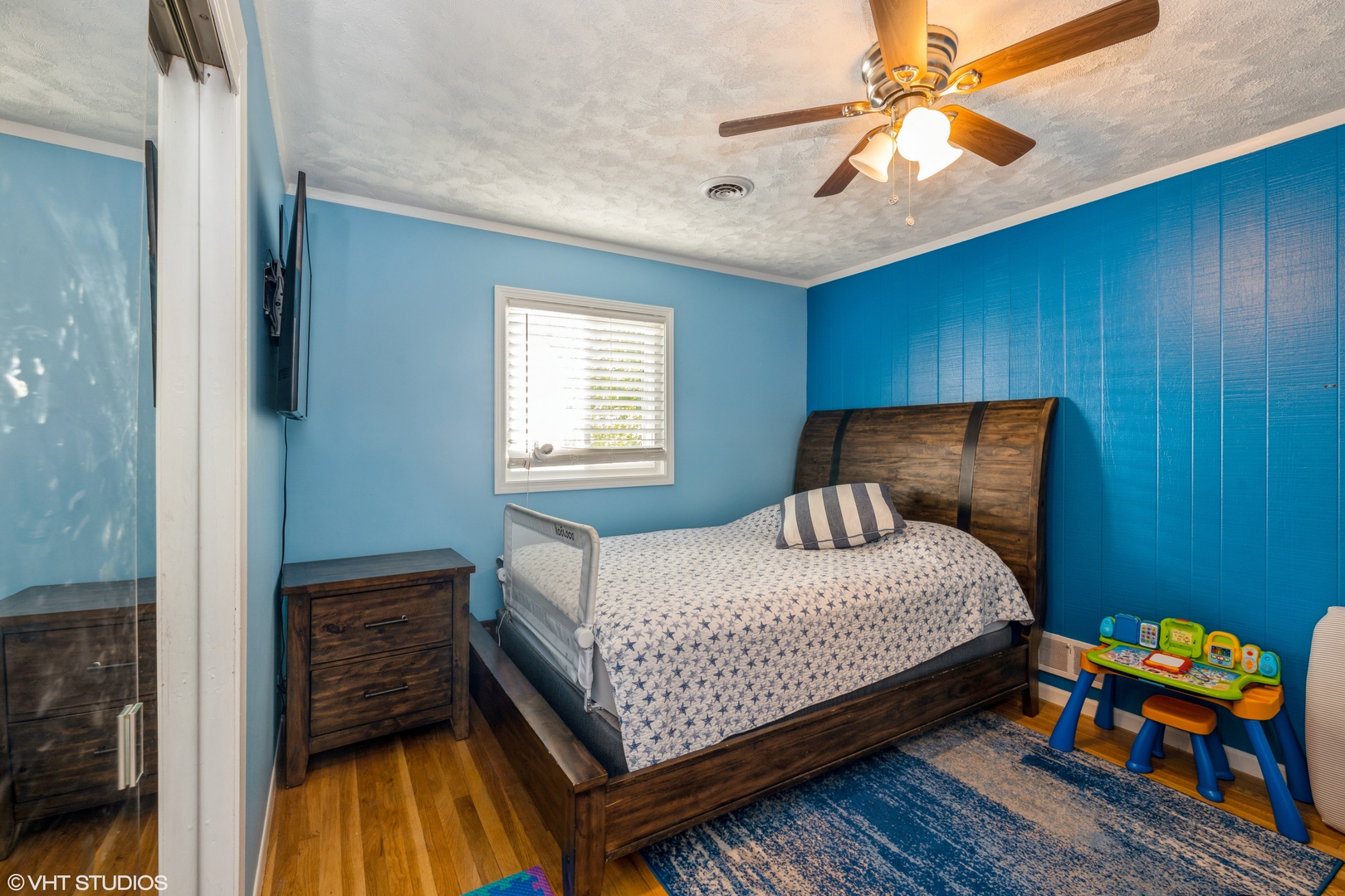 8705 45th Street Lyons, IL 60534 - Photo 14 of 19 a bedroom with a bed and a window