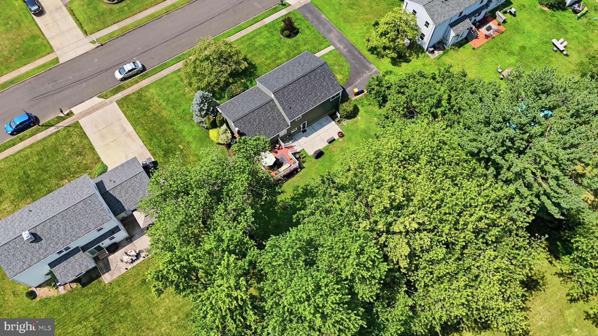 298 Hickory Road Yardley, PA 19067 - Photo 46 of 48 Lush greenery surrounds cozy homes.