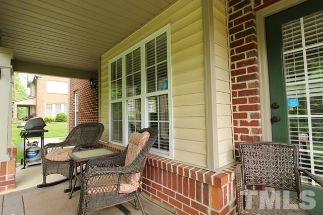 9914 Reanne Court Raleigh, NC 27617 - Photo 3 of 25 a building outdoor space with patio furniture
