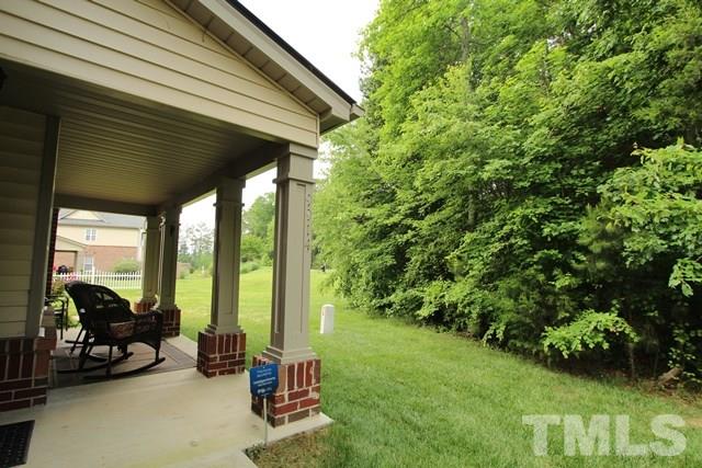 9914 Reanne Court Raleigh, NC 27617 - Photo 24 of 25 a backyard of a house with seating space
