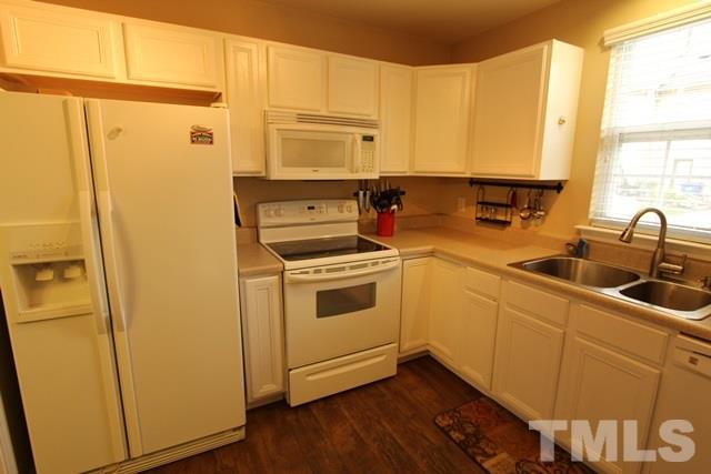 9914 Reanne Court Raleigh, NC 27617 - Photo 10 of 25 a view of a kitchen with sink dryer and washer