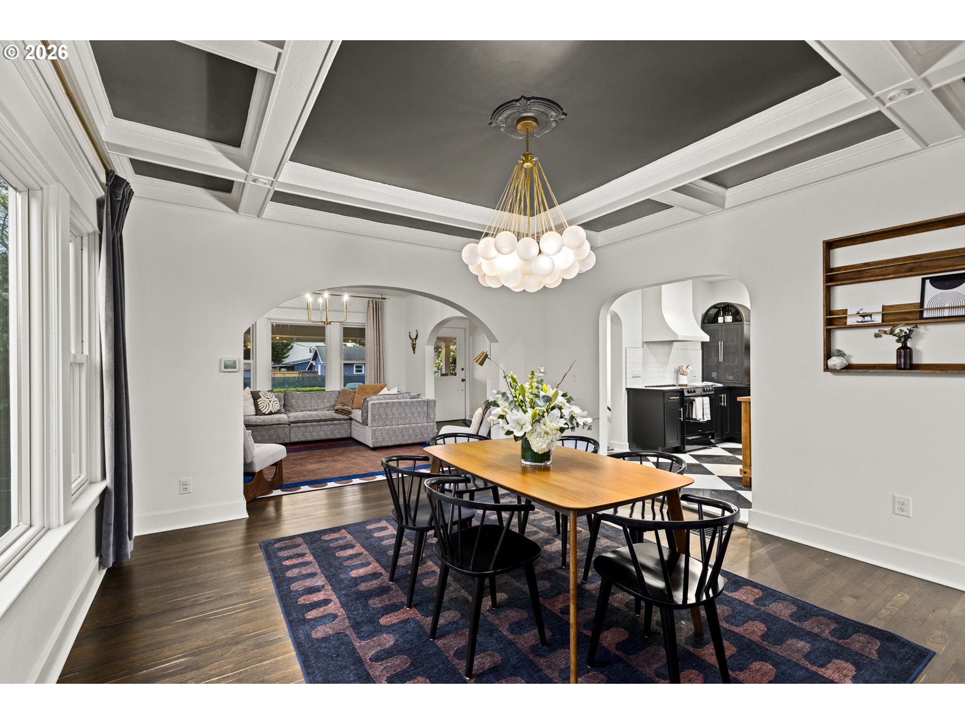 7123 Southeast Rhone Street Portland, OR 97206 - Photo 11 of 48 a view of a dining room with furniture and chandelier