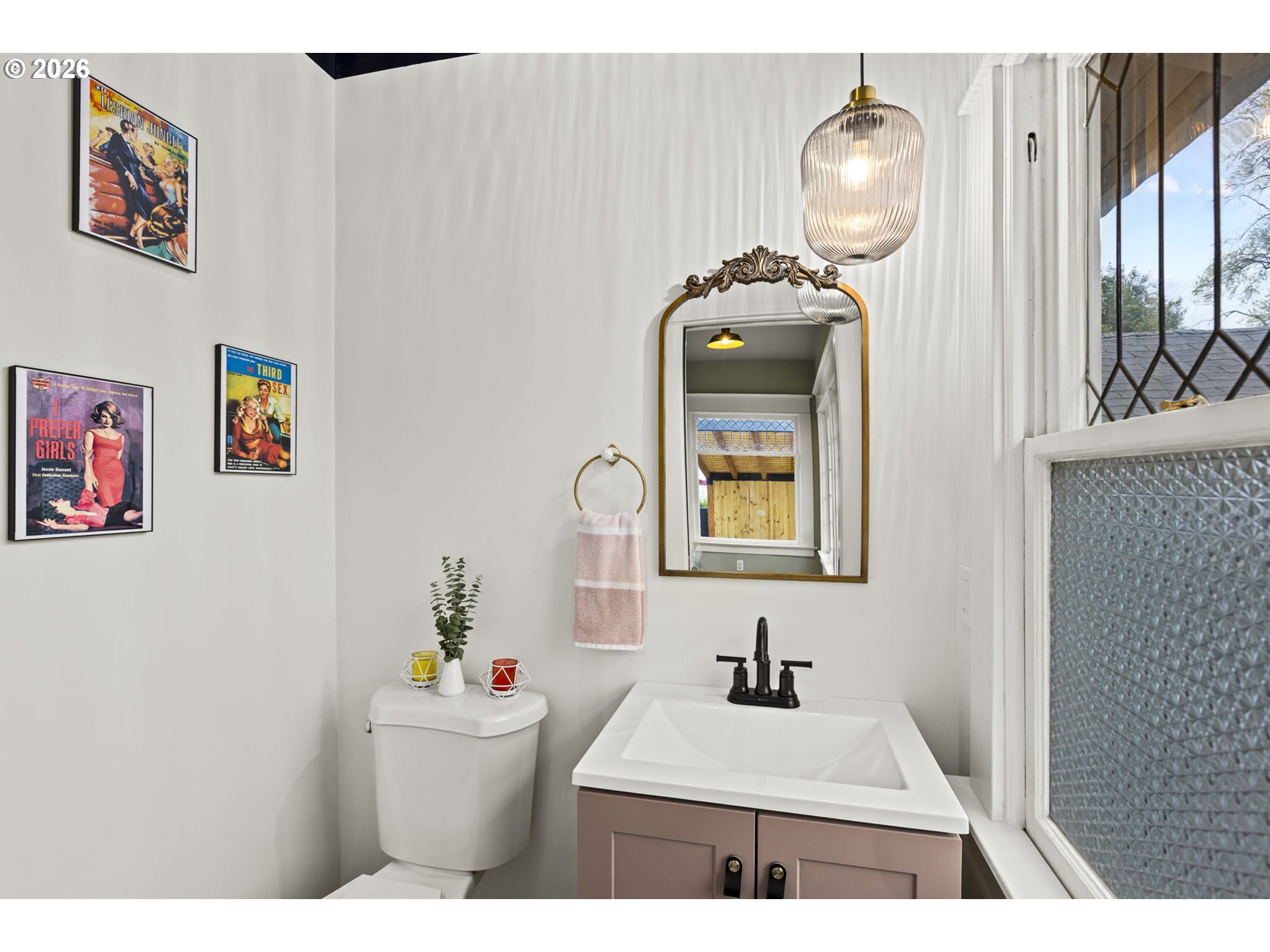 7123 Southeast Rhone Street Portland, OR 97206 - Photo 21 of 48 a bathroom with a sink mirror and vanity