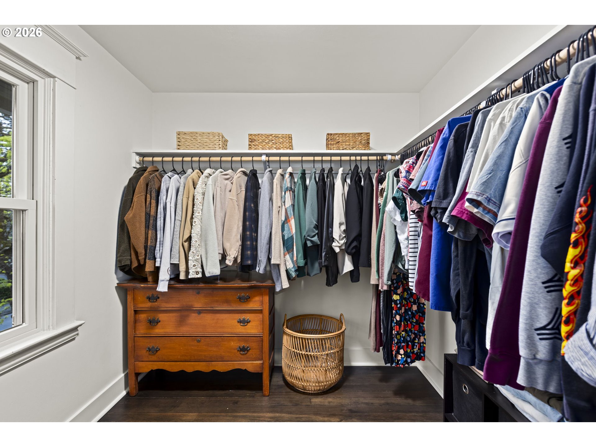 7123 Southeast Rhone Street Portland, OR 97206 - Photo 26 of 48 a view of walk in closet with clothes and shoes