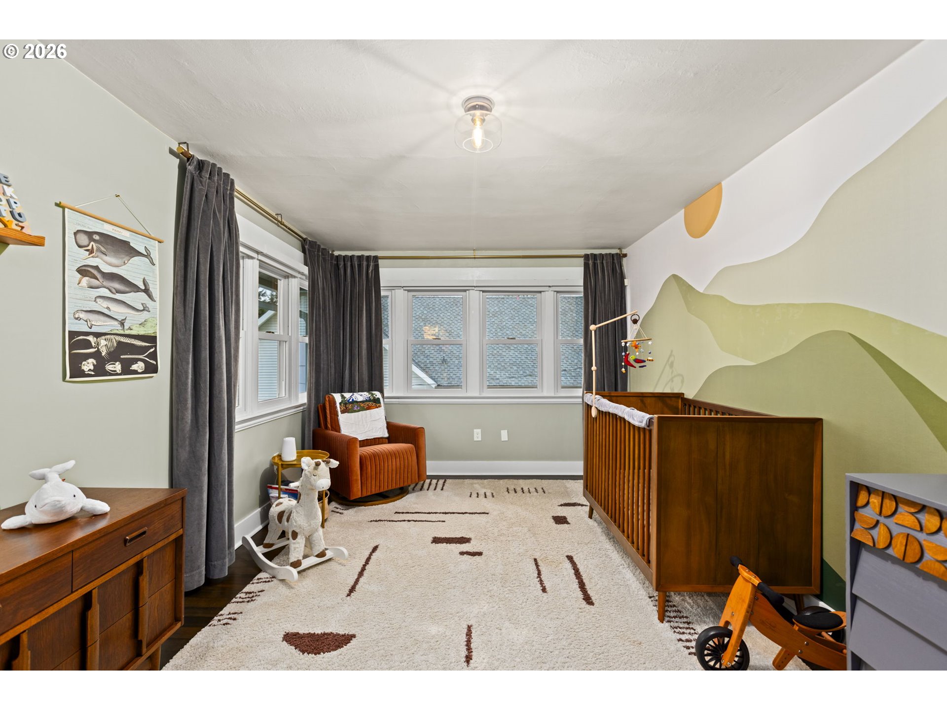 7123 Southeast Rhone Street Portland, OR 97206 - Photo 30 of 48 a living room with furniture and a large window