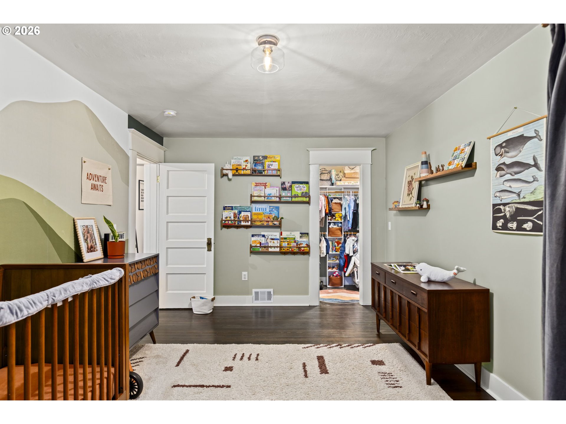 7123 Southeast Rhone Street Portland, OR 97206 - Photo 31 of 48 a living room with lots of furniture and storage