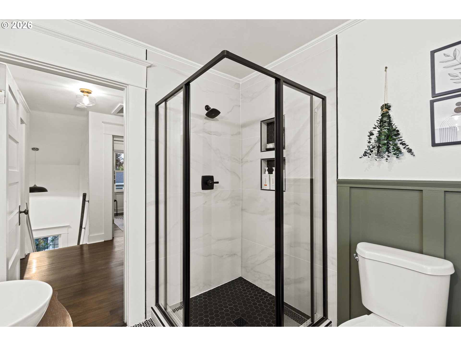 7123 Southeast Rhone Street Portland, OR 97206 - Photo 36 of 48 a bathroom with a shower and a toilet