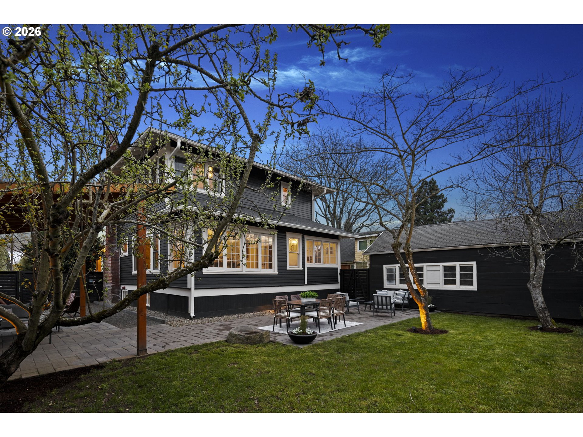 7123 Southeast Rhone Street Portland, OR 97206 - Photo 43 of 48 a front view of a house with garden