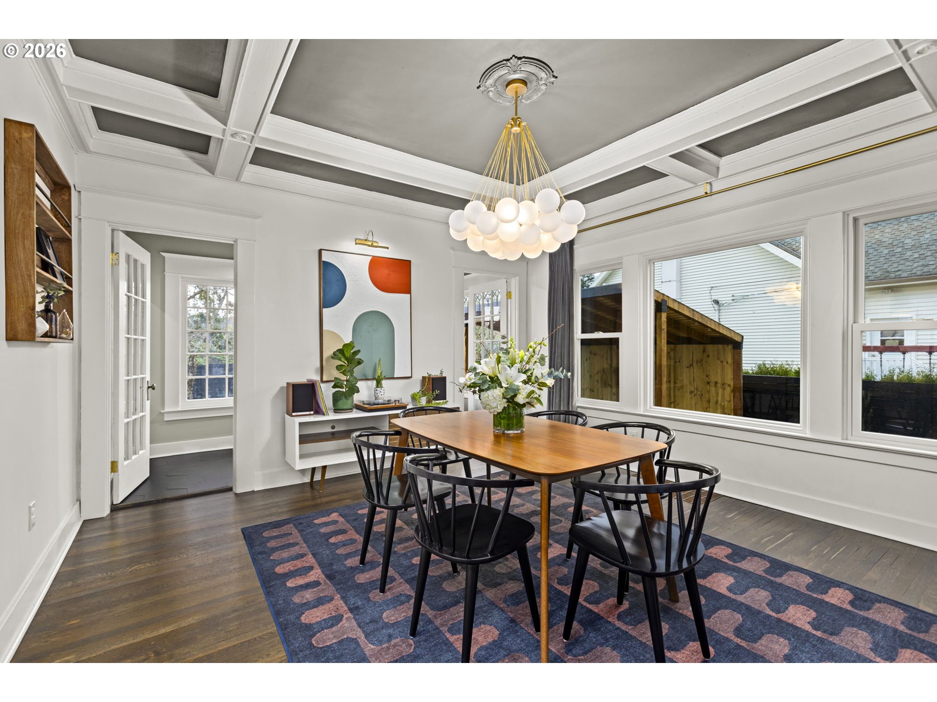 7123 Southeast Rhone Street Portland, OR 97206 - Photo 10 of 48 a view of a dining room with furniture and wooden floor