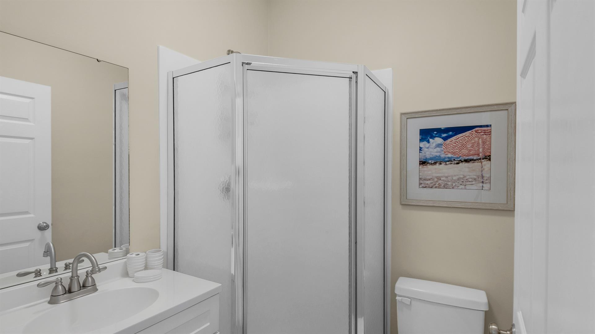 34 Heron's Watch Way, Unit 5101 Santa Rosa Beach, FL 32459 - Photo 10 of 18 a bathroom with a shower a sink and a mirror