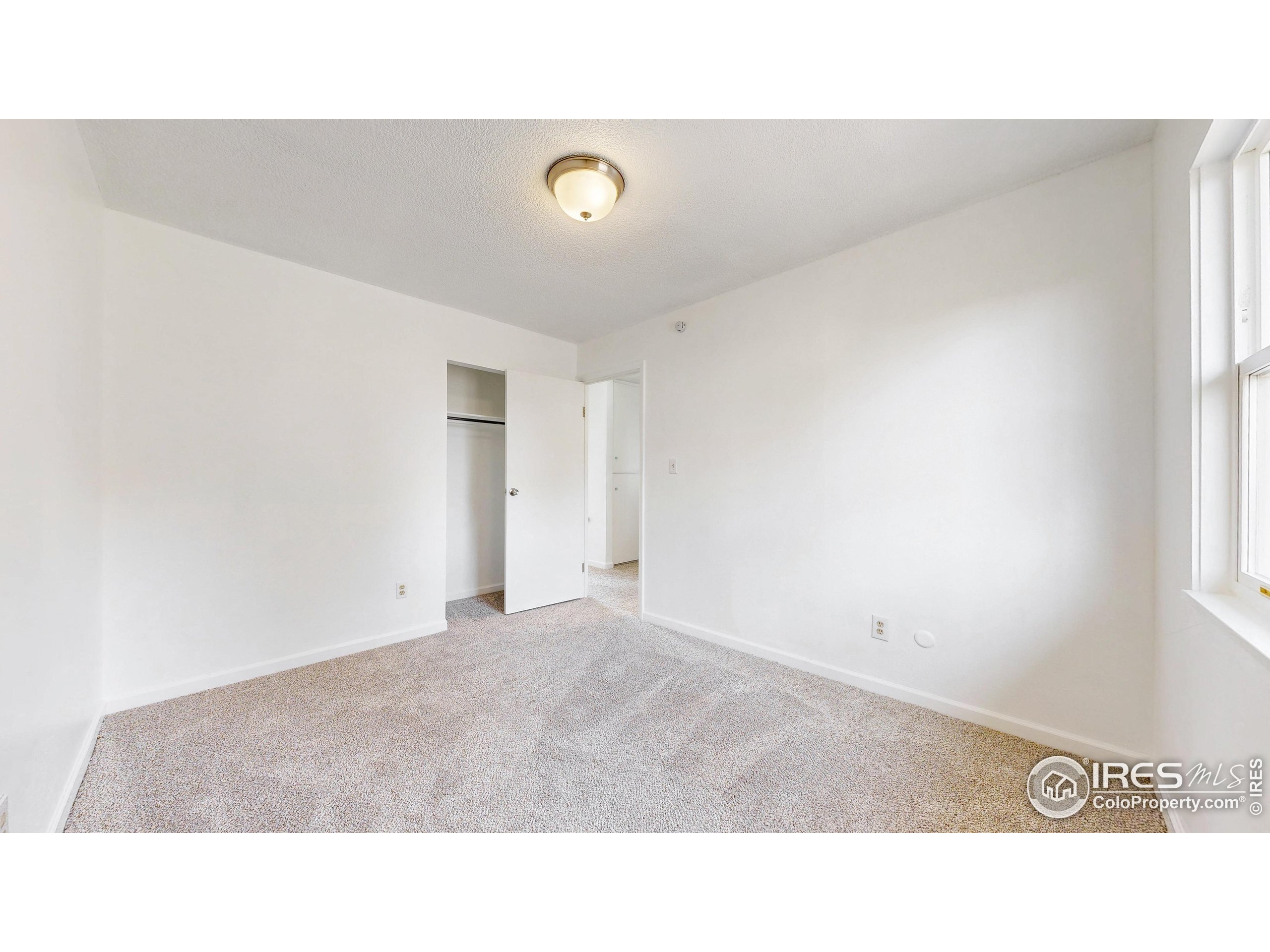 117 Fry Street Ault, CO 80610 - Photo 22 of 39 a black and white photo of a living room