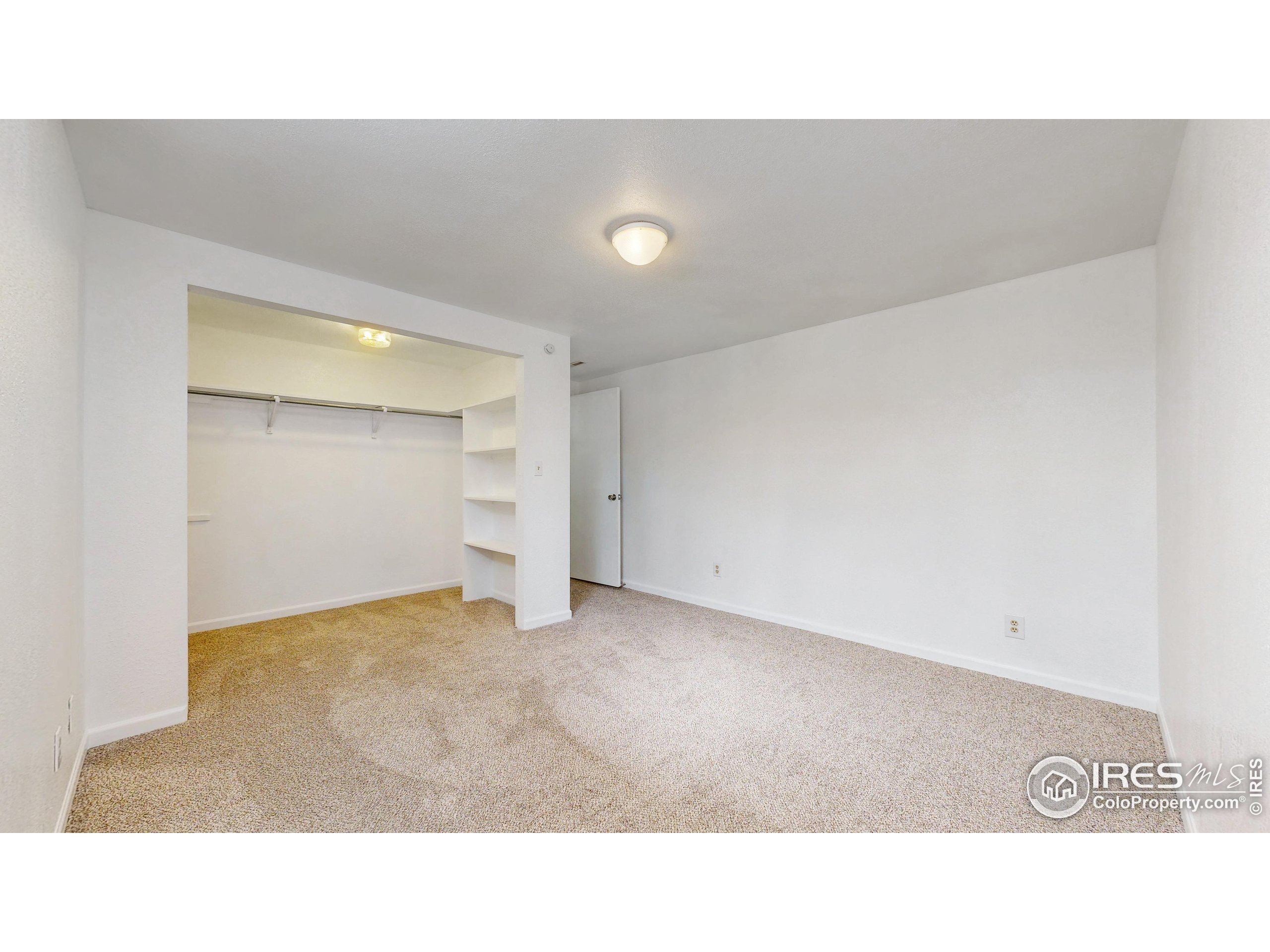 117 Fry Street Ault, CO 80610 - Photo 24 of 39 a open hall with a bench