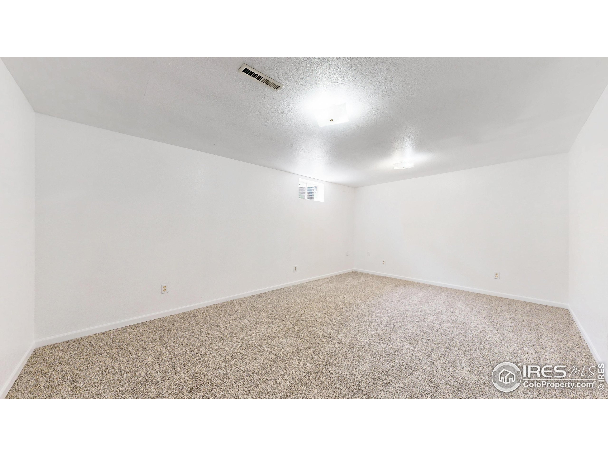 117 Fry Street Ault, CO 80610 - Photo 25 of 39 a open hall with a bench