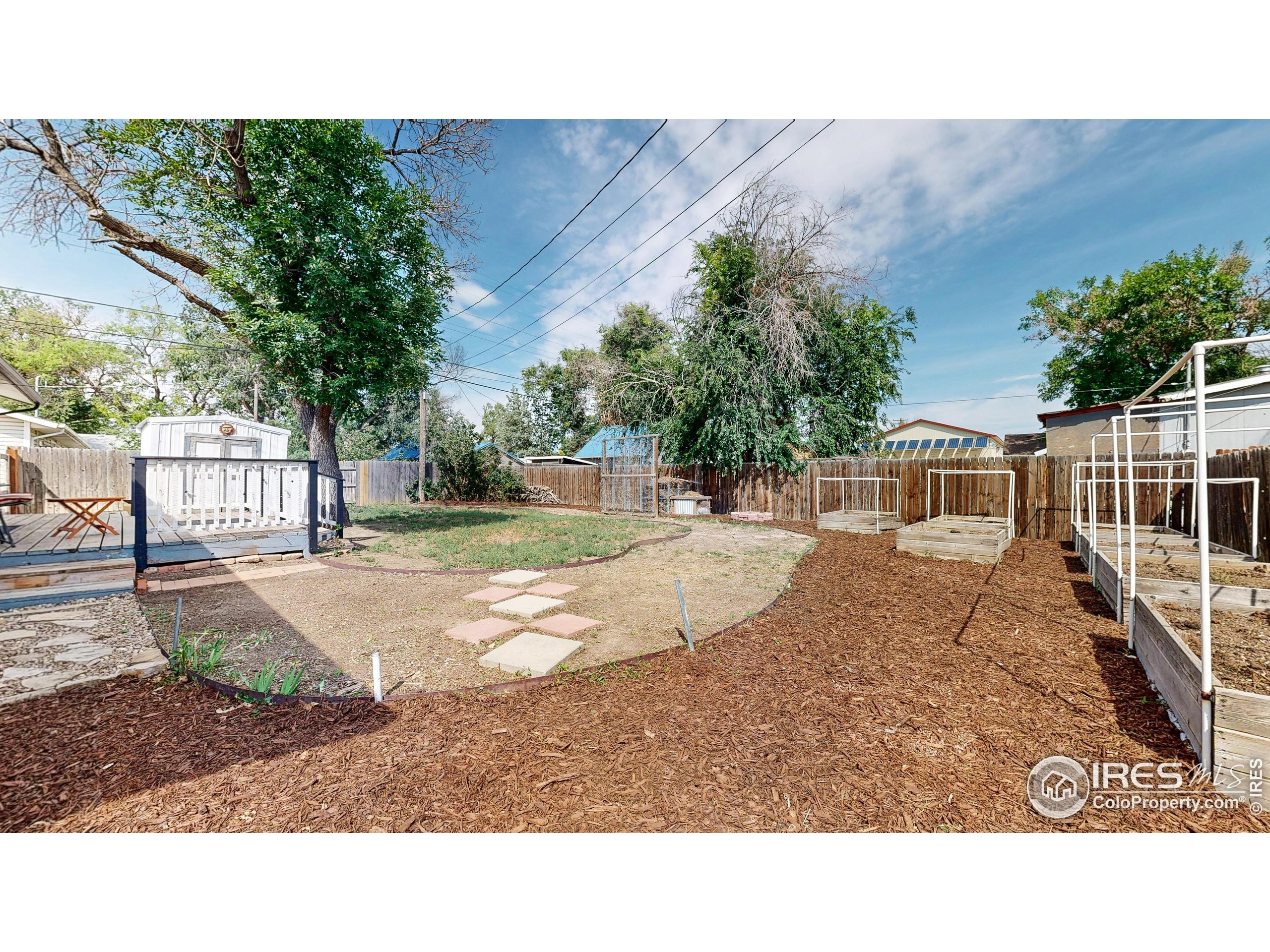 117 Fry Street Ault, CO 80610 - Photo 32 of 39 a view of a house with a yard