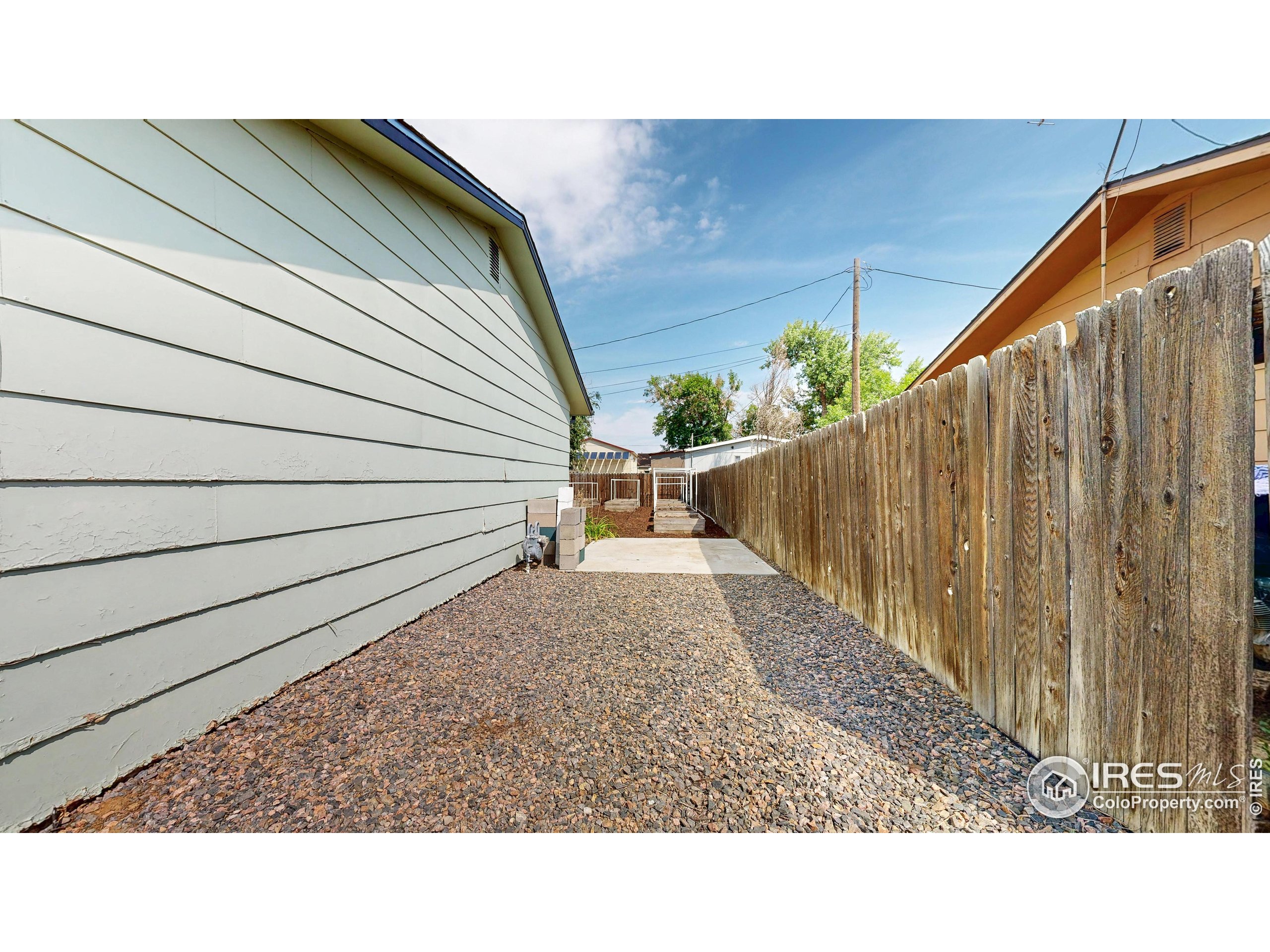 117 Fry Street Ault, CO 80610 - Photo 33 of 39 a view of outdoor space and deck