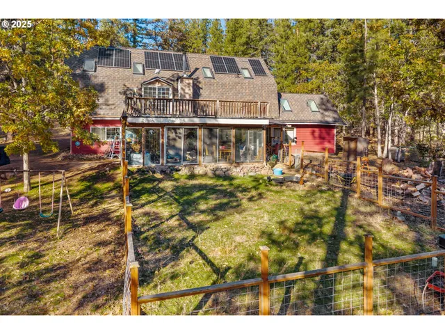 a view of a house with a swimming pool