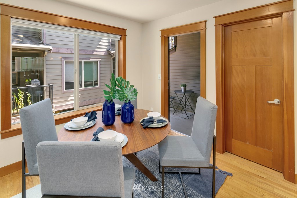 1717 18th Avenue, Unit B Seattle, WA 98122 - Photo 8 of 25 a dining room with furniture and wooden floor