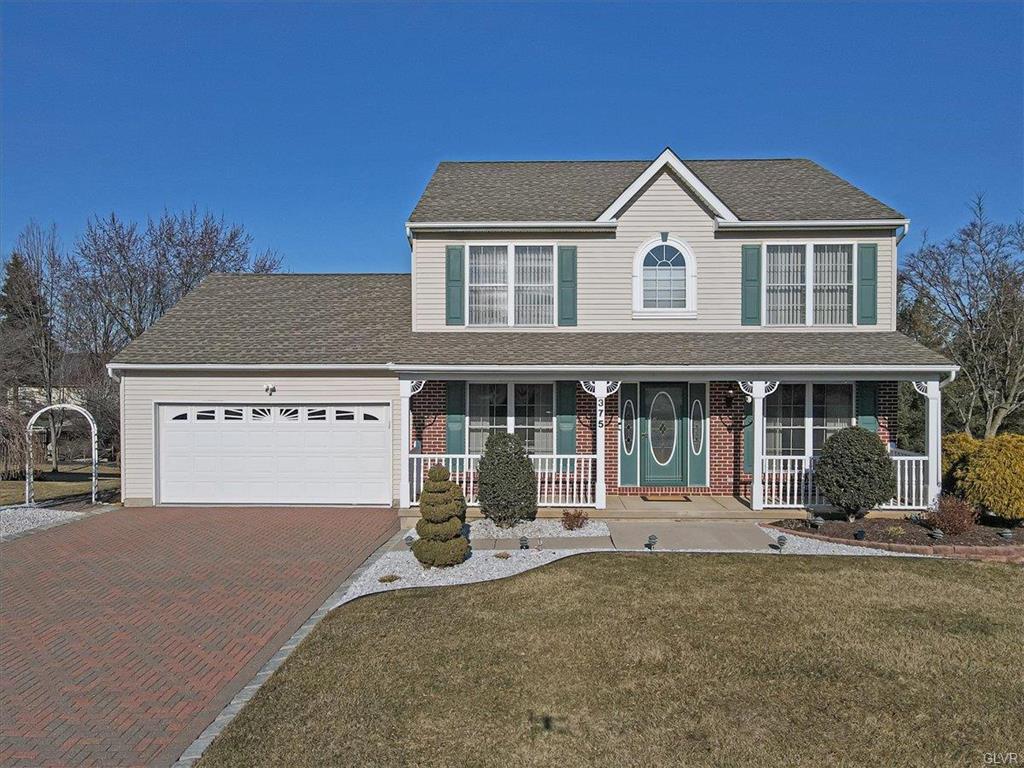 375 Ramblewood Drive Easton, PA 18040 - Photo 1 of 47 a front view of a house with a yard and garage