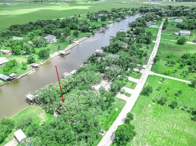 a view of a garden with a lake view