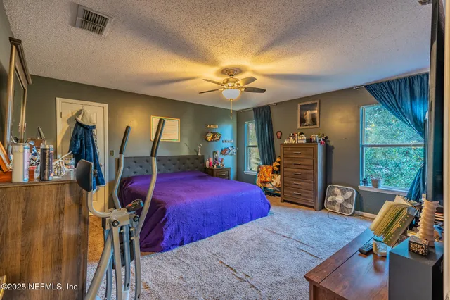 a bathroom with a sink double vanity and a mirror