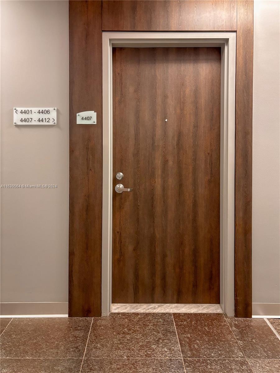 92 Southwest 3rd Street, Unit 4407 Miami, FL 33130 - Photo 15 of 21 a view of wooden door