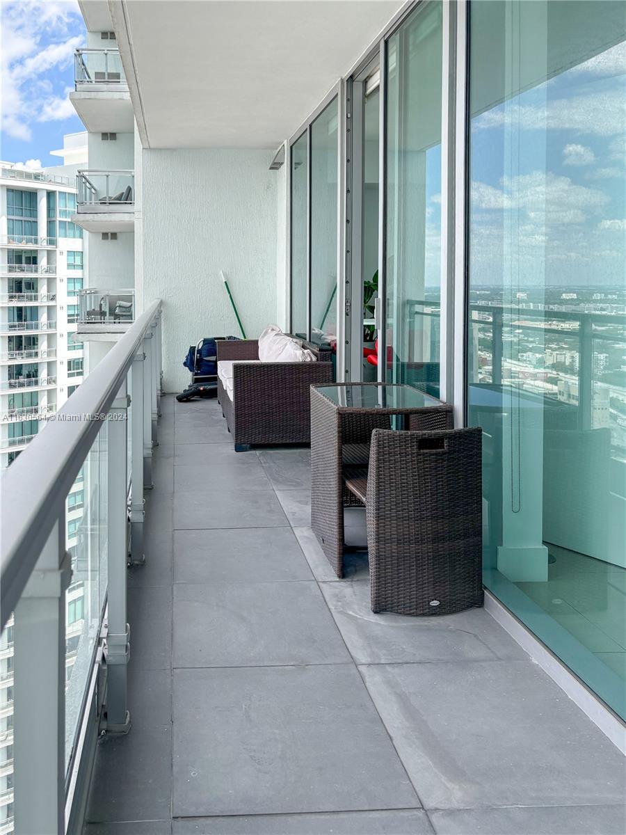 92 Southwest 3rd Street, Unit 4407 Miami, FL 33130 - Photo 8 of 21 a lobby with furniture and window