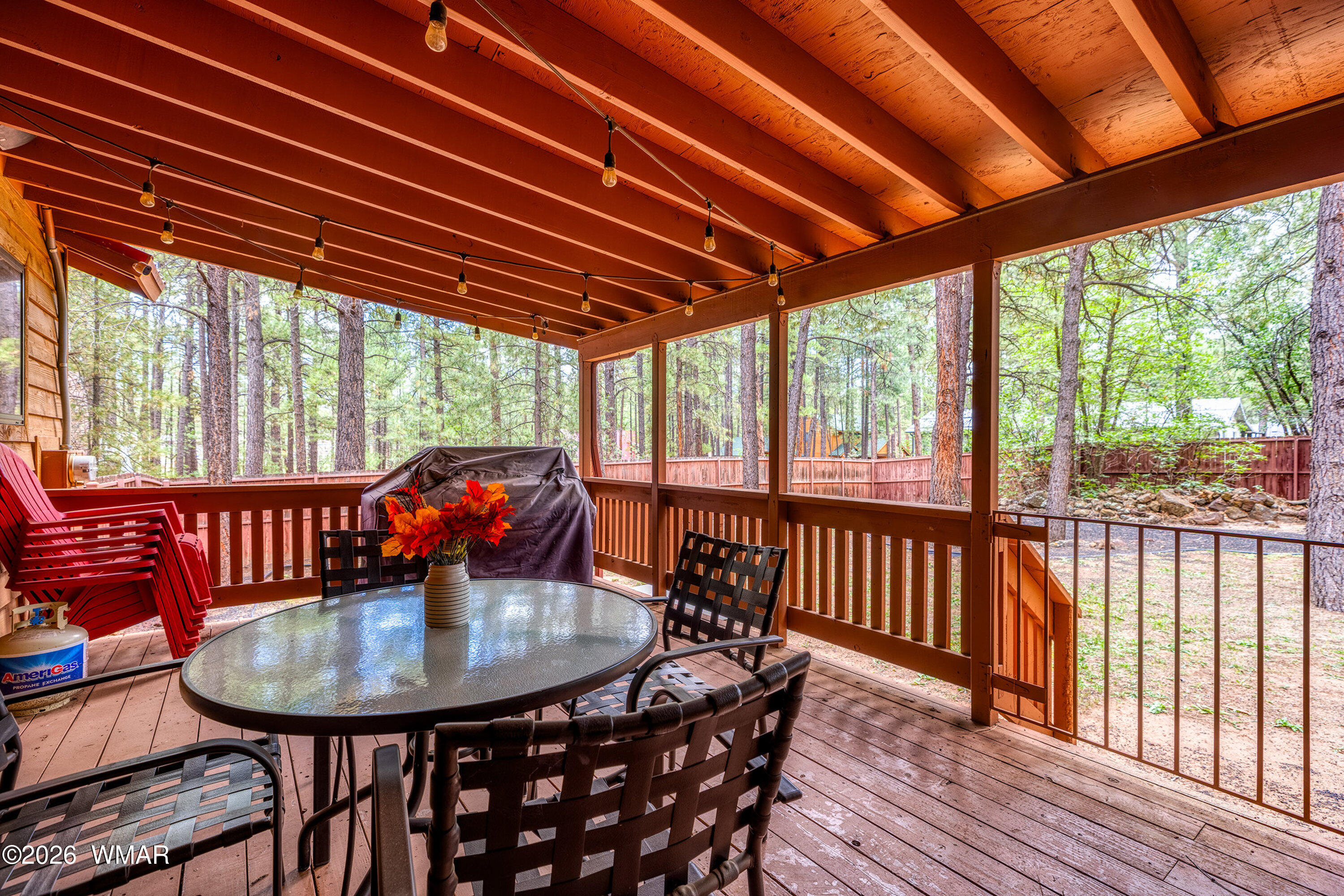 5155 Buck Springs Road Pinetop, AZ 85935 - Photo 31 of 37 a view of a dining room with furniture window and outside view