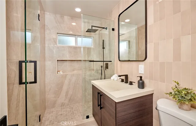 a bathroom with a sink and mirror