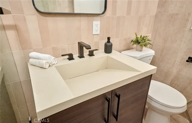 a bathroom with a sink and a toilet