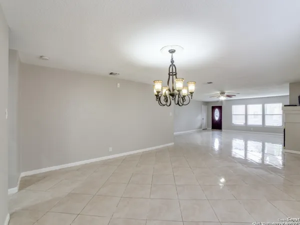 a view of a room with a chandelier