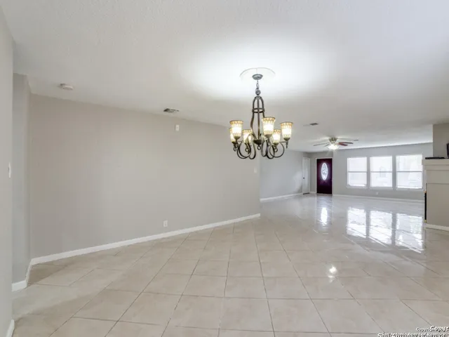 a view of a room with a chandelier